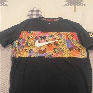 Nike Black Tee with Vibrant Graphic and Chains